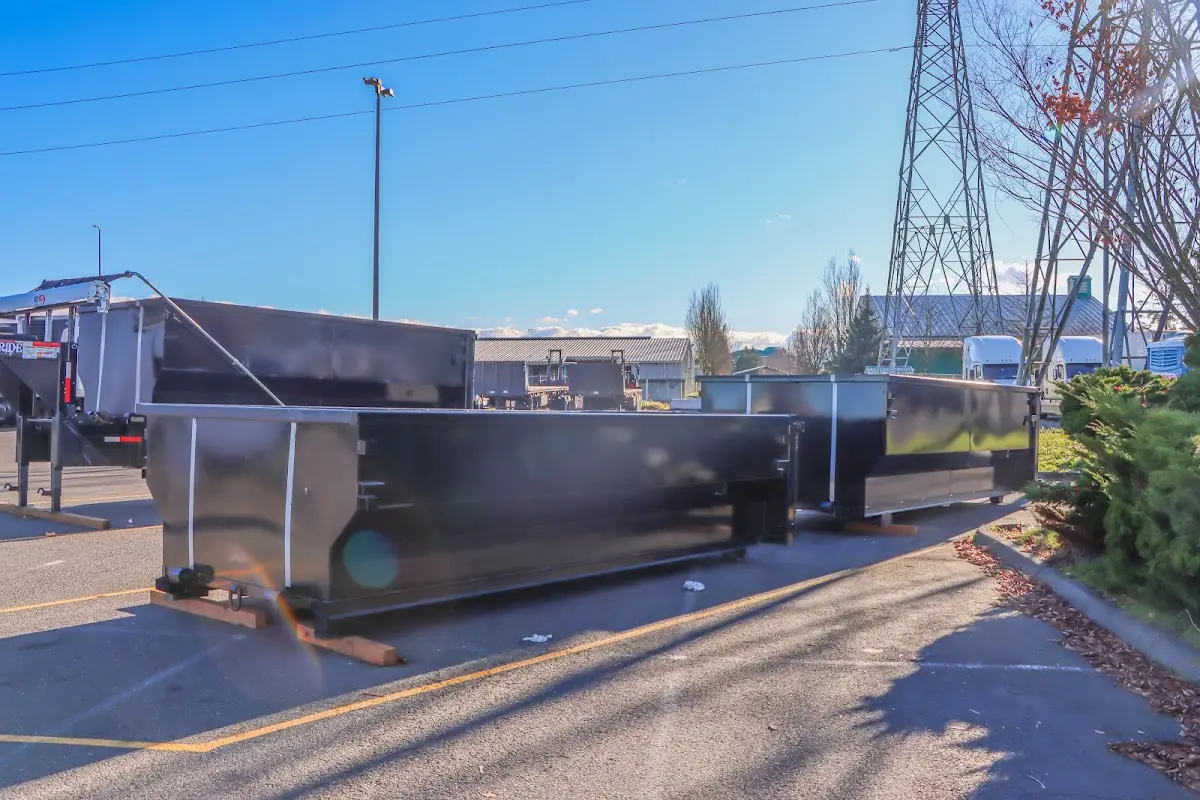 Roll-off dumpster ready for waste disposal at job site for 4 Yard Dumpster Rental in Orono